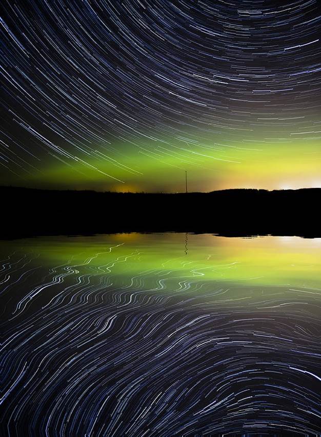 Star trails in lake